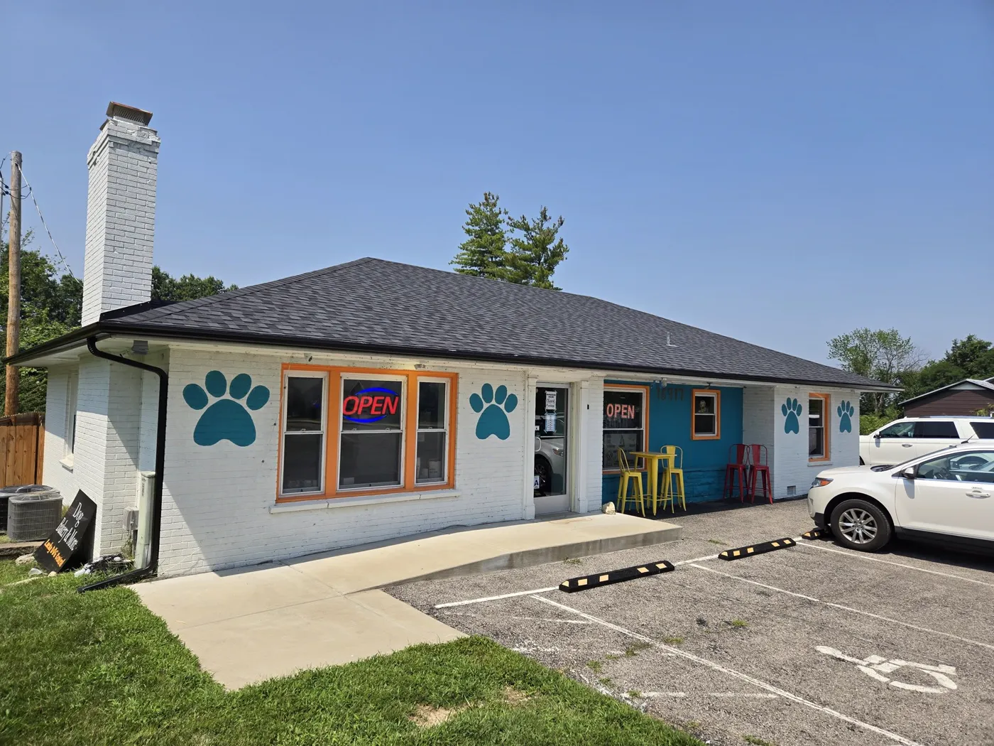 St. Louis-area commercial storefront with a new black architectural shingle hip roof